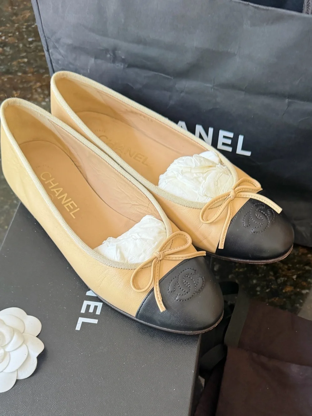 CHANEL Two-Tone Tan and Black Leather Cap-Toe Ballet Flats